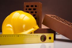 Werkzeug und Baumaschinen aus Container in Wall en